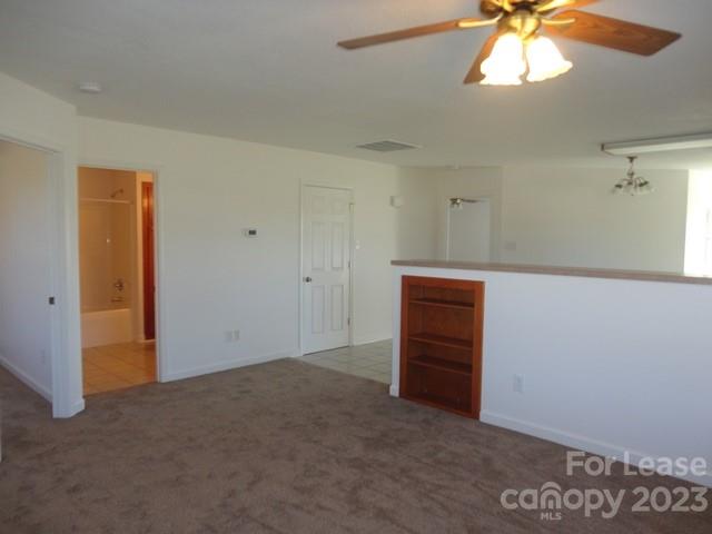 110 Rowan Road, Unit B Cleveland, NC 27013 - Photo 4 of 15 a view of an empty room with a window