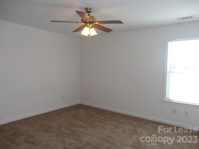 110 Rowan Road, Unit B Cleveland, NC 27013 - Photo 9 of 15 an empty room with a window