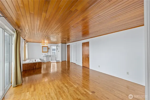 a view of livingroom with furniture and floor to ceiling window