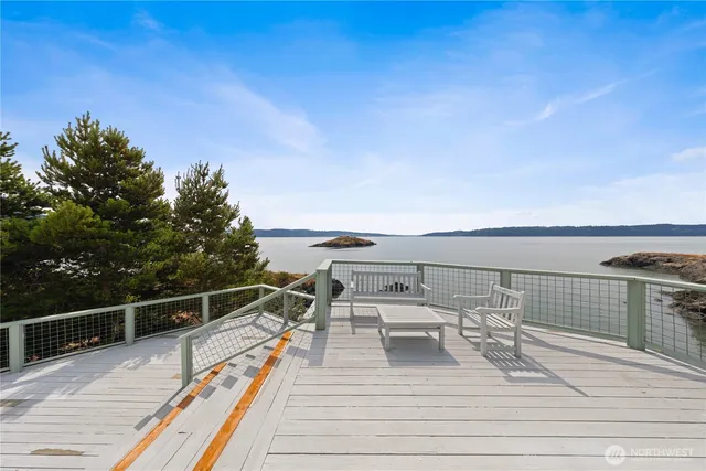 a view of balcony with wooden floor