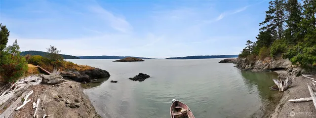 a front view of house with yard view and trees around