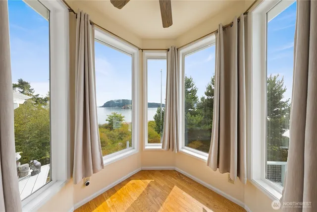 a view of a living room and windows