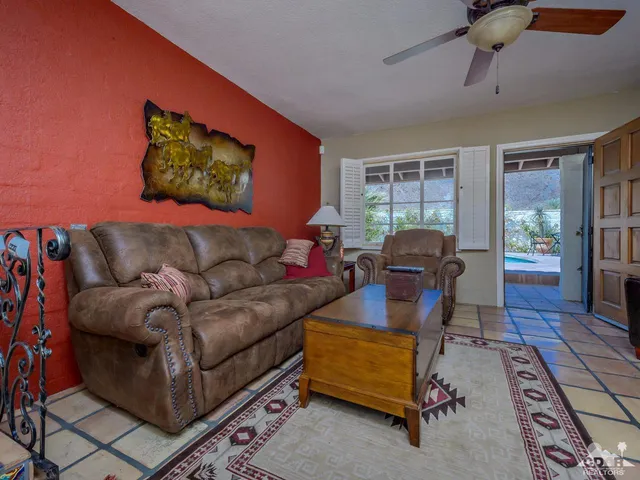 a bathroom with a sink toilet and mirror