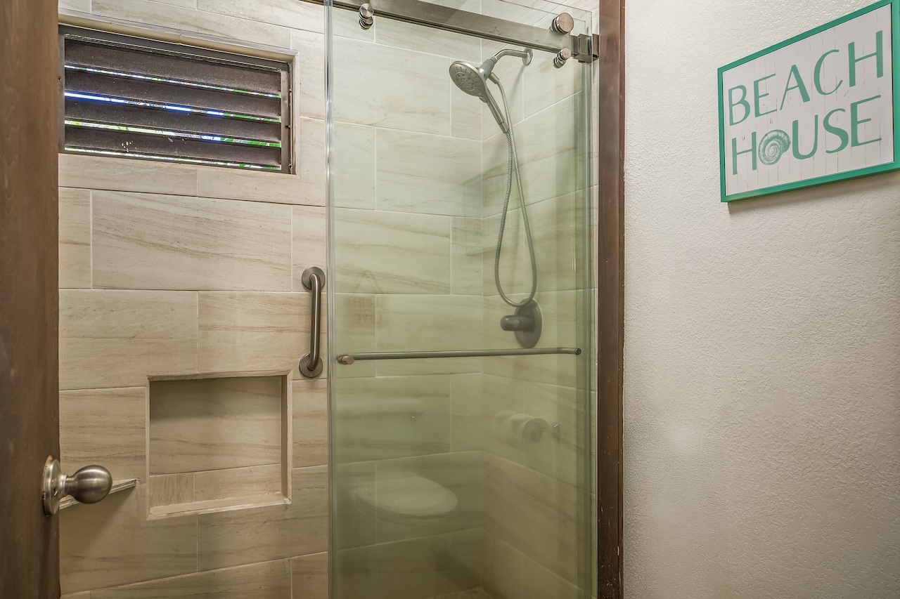 2253 Poipu Road, Unit 115 Koloa, HI 96756 - Photo 17 of 24 a bathroom with a shower