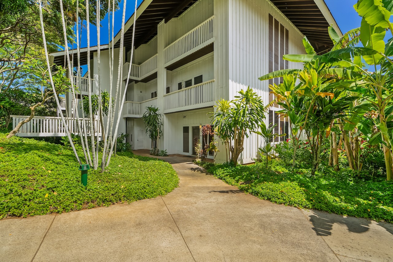 2253 Poipu Road, Unit 115 Koloa, HI 96756 - Photo 19 of 24 a view of a garden with pathway