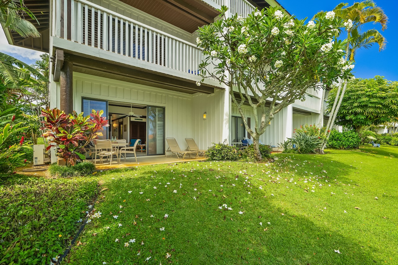 2253 Poipu Road, Unit 115 Koloa, HI 96756 - Photo 7 of 24 a view of a house with pool and garden