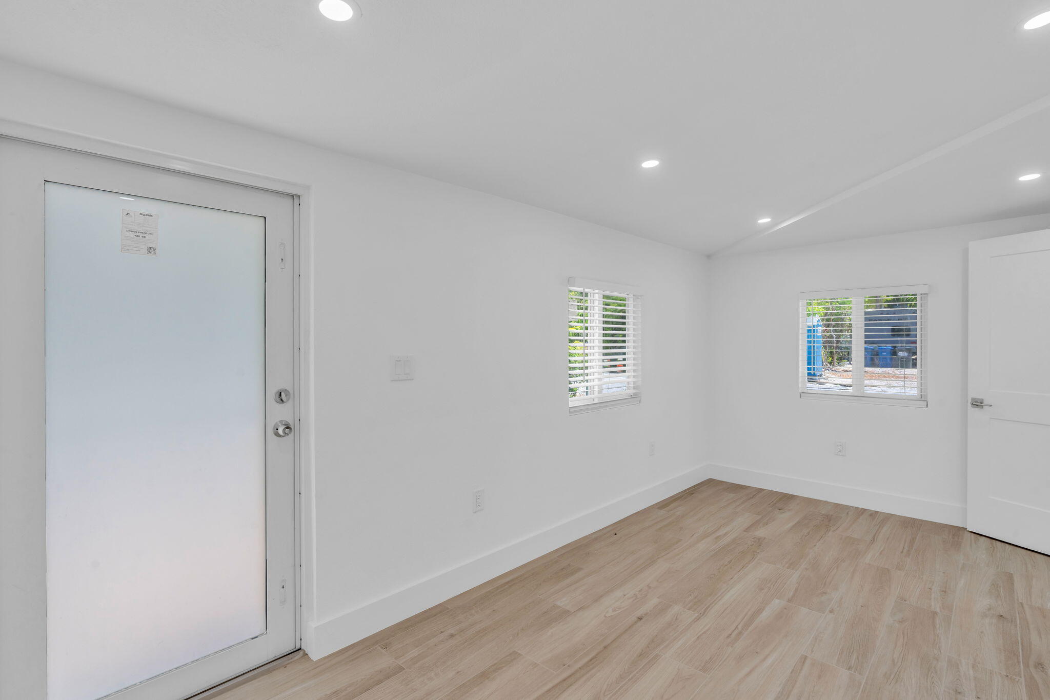 15 Seaside Avenue Key Largo, FL 33037 - Photo 24 of 39 a view of a room with wooden floor and windows