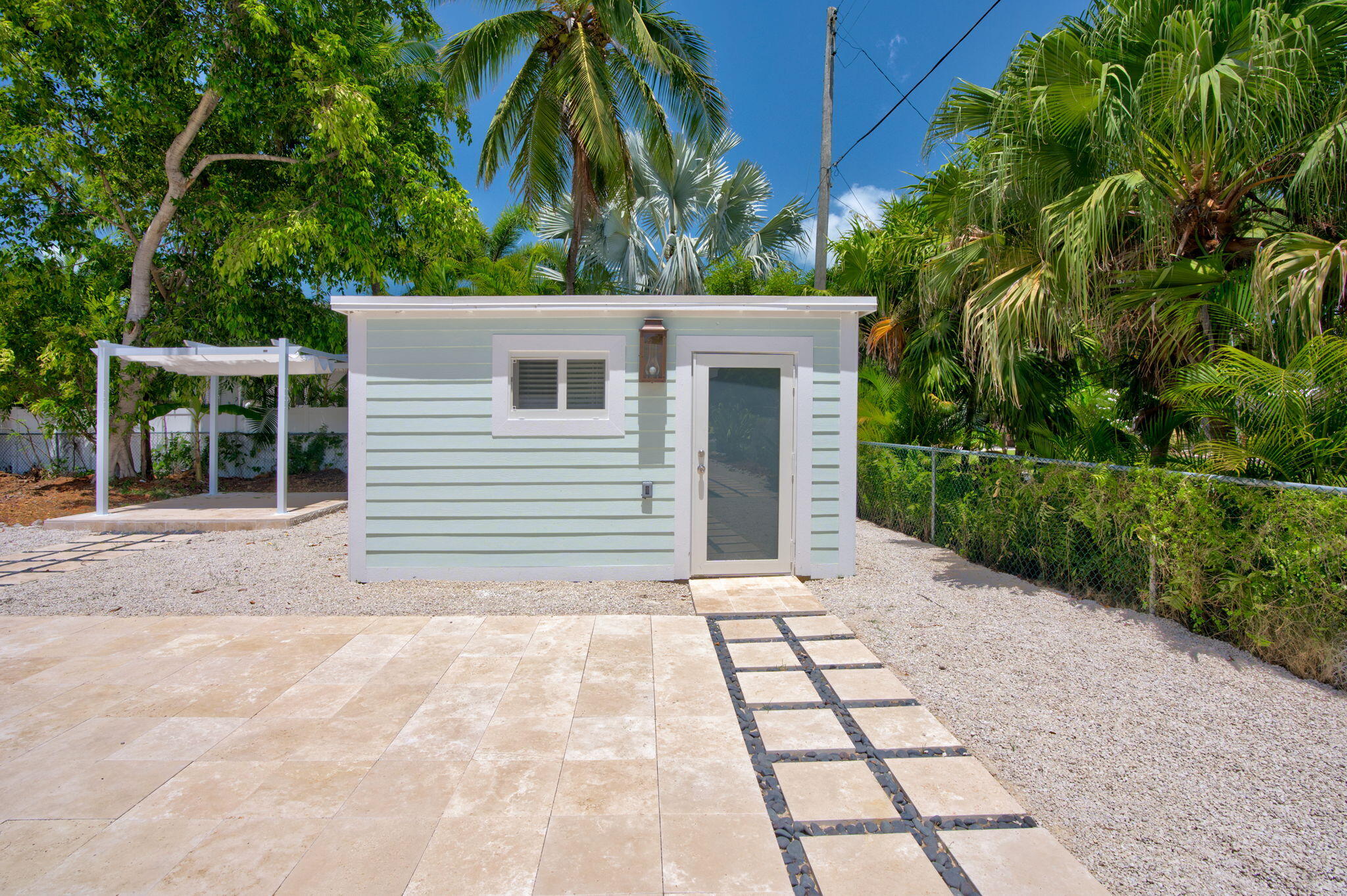 15 Seaside Avenue Key Largo, FL 33037 - Photo 27 of 39 a view of backyard of house with green space