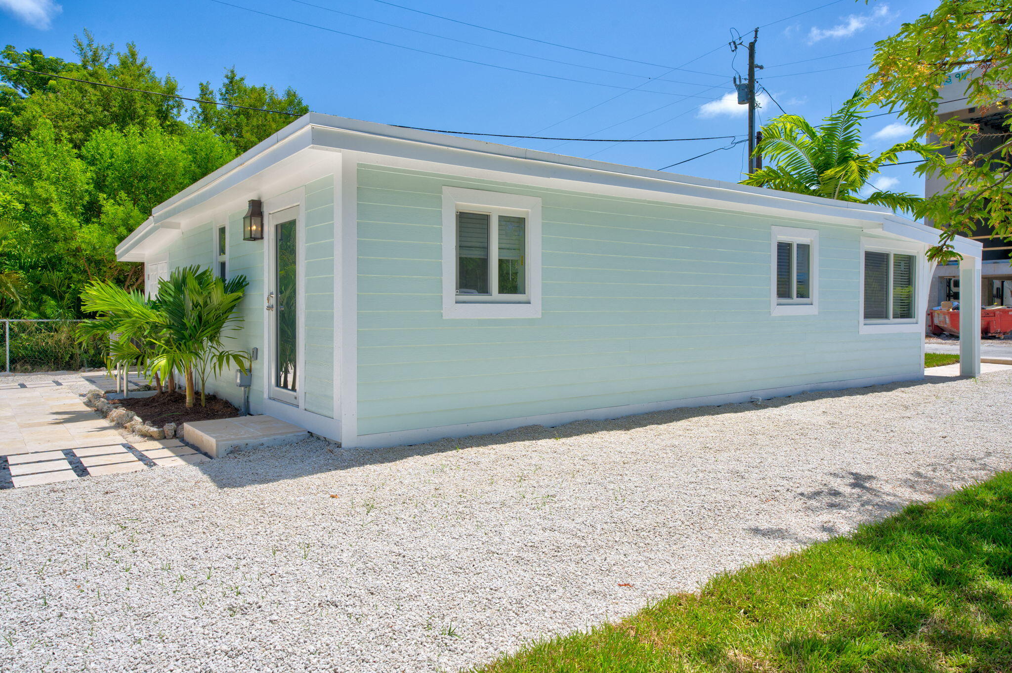 15 Seaside Avenue Key Largo, FL 33037 - Photo 3 of 39 a house with a yard