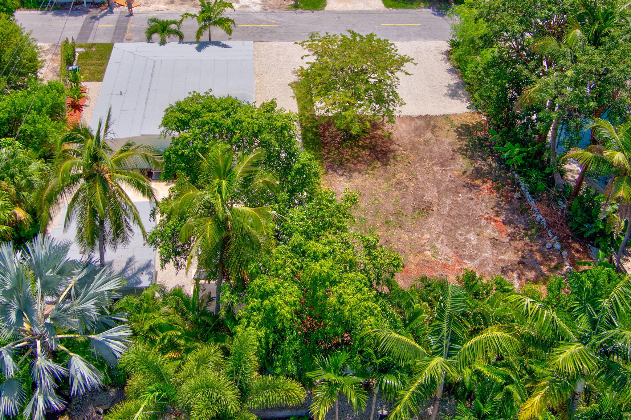 15 Seaside Avenue Key Largo, FL 33037 - Photo 9 of 39 an aerial view of a house with a yard and garden