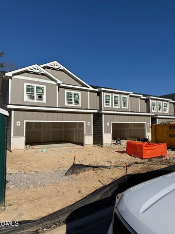 a kitchen with stainless steel appliances granite countertop a stove and a microwave with granite countertops