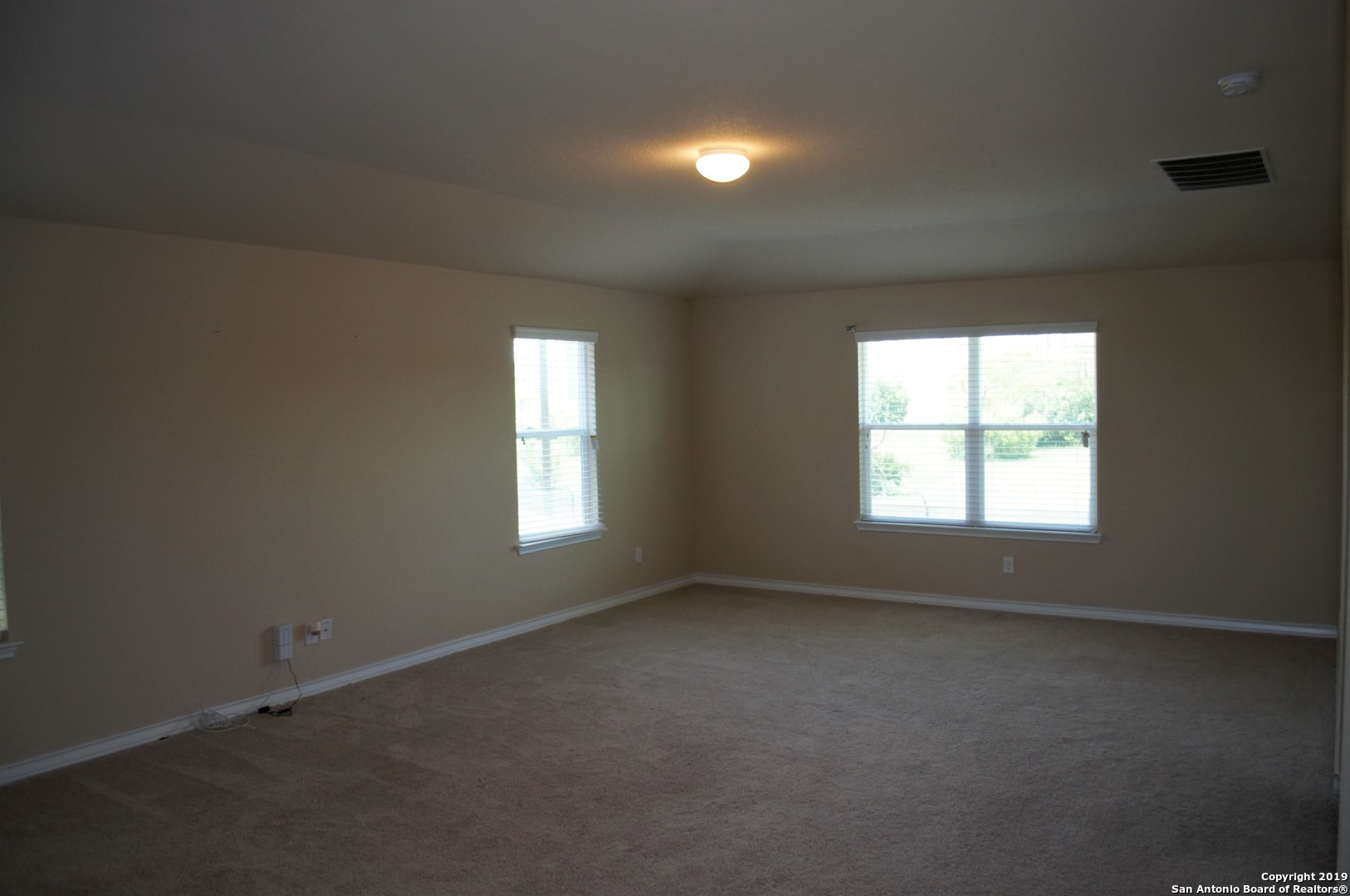 1623 Tree San Antonio, TX 78245 - Photo 13 of 21 an empty room with a window