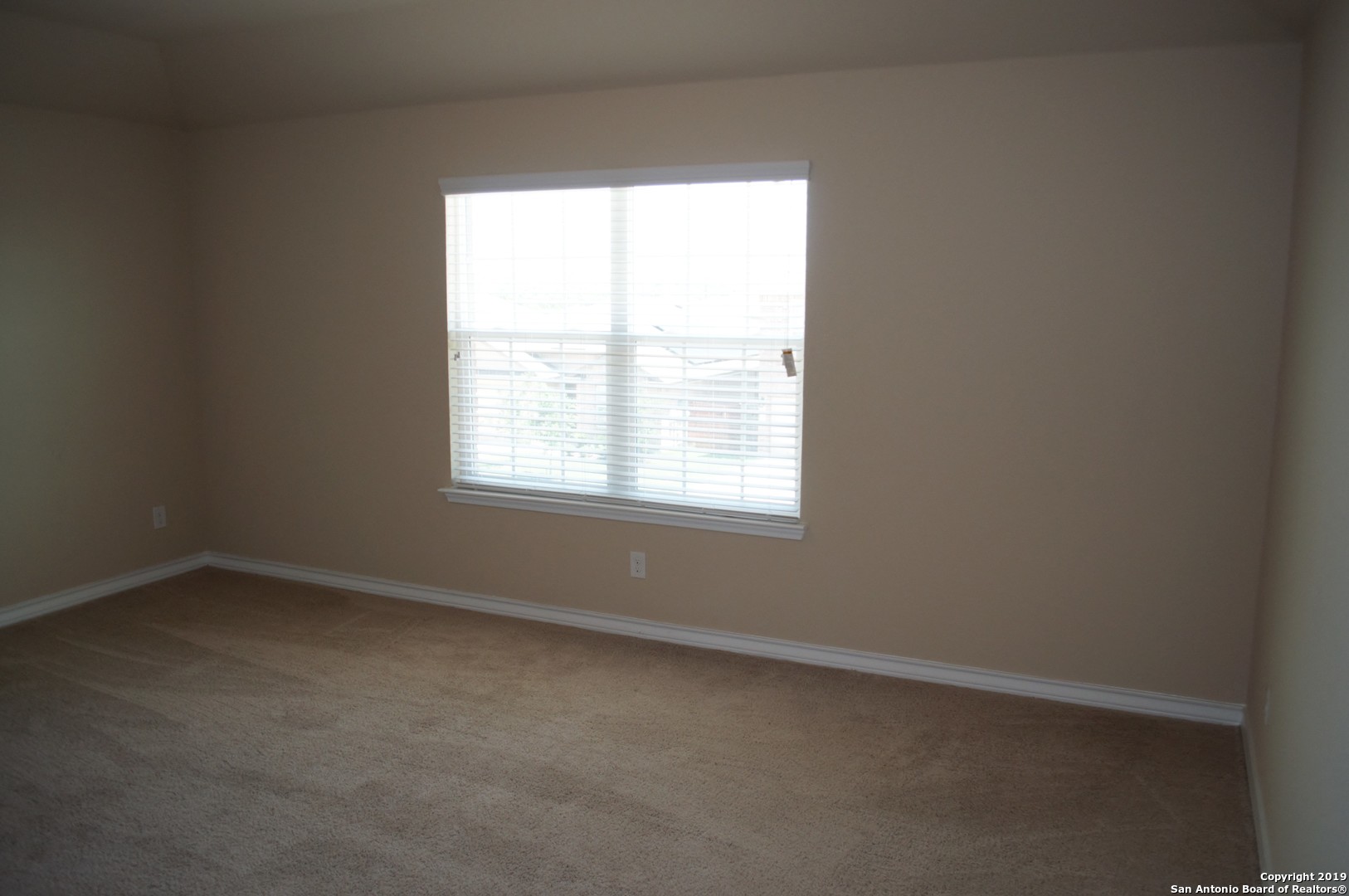 1623 Tree San Antonio, TX 78245 - Photo 18 of 21 an empty room with a window