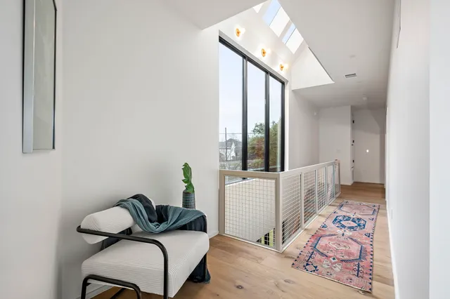 a view of a house with backyard and porch