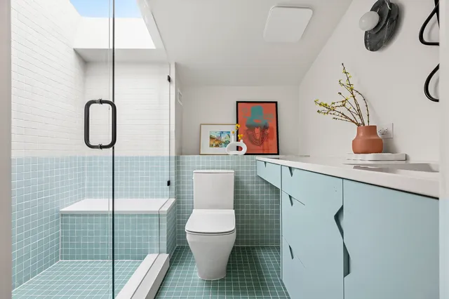 an aerial view of a house with a garden