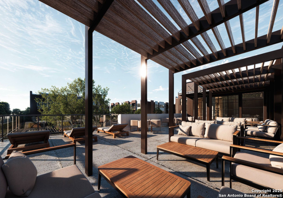 5135 Wurzbach Road, Unit 601 San Antonio, TX 78238 - Photo 4 of 14 a outdoor living space with patio furniture and a potted plant