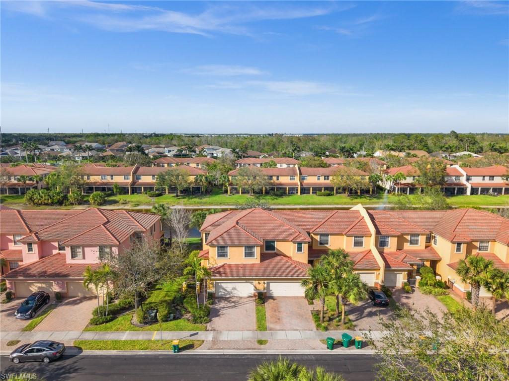 7357 Bristol Circle Naples, FL 34120 - Photo 26 of 44 an aerial view of a house with a garden
