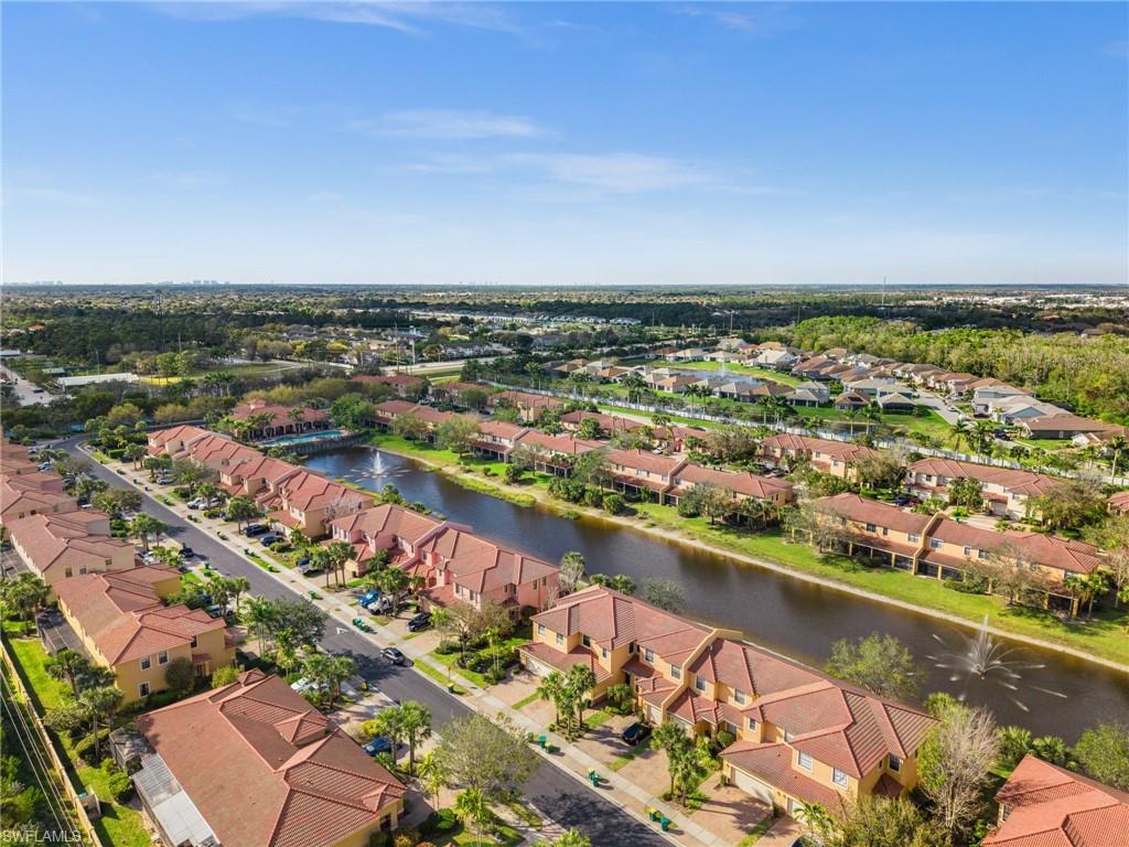7357 Bristol Circle Naples, FL 34120 - Photo 29 of 44 an aerial view of a city with mountains