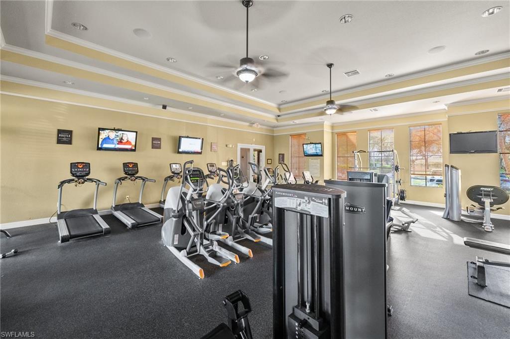7357 Bristol Circle Naples, FL 34120 - Photo 34 of 44 a view of a room with gym equipment