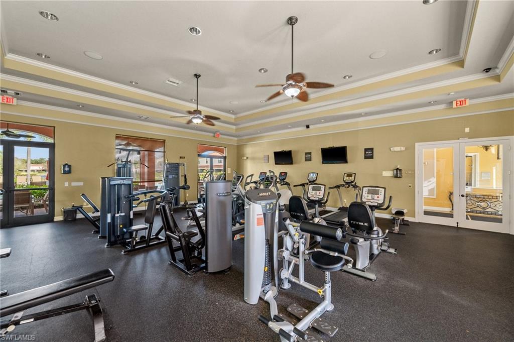 7357 Bristol Circle Naples, FL 34120 - Photo 37 of 44 a view of a room with gym equipment