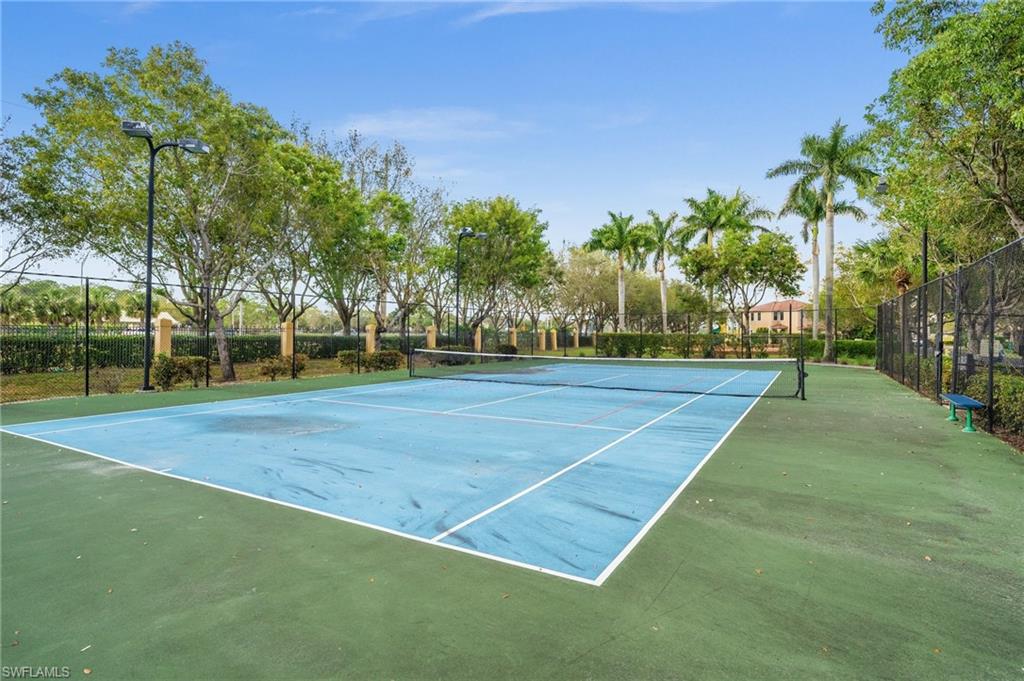7357 Bristol Circle Naples, FL 34120 - Photo 40 of 44 a view of a tennis court