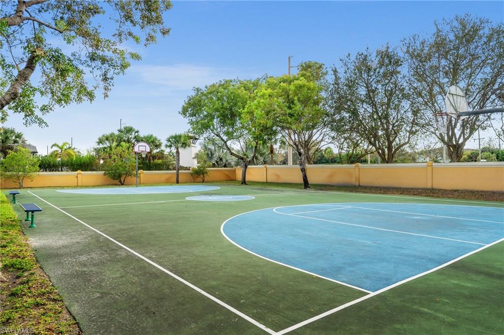 7357 Bristol Circle Naples, FL 34120 - Photo 41 of 44 a view of a tennis court