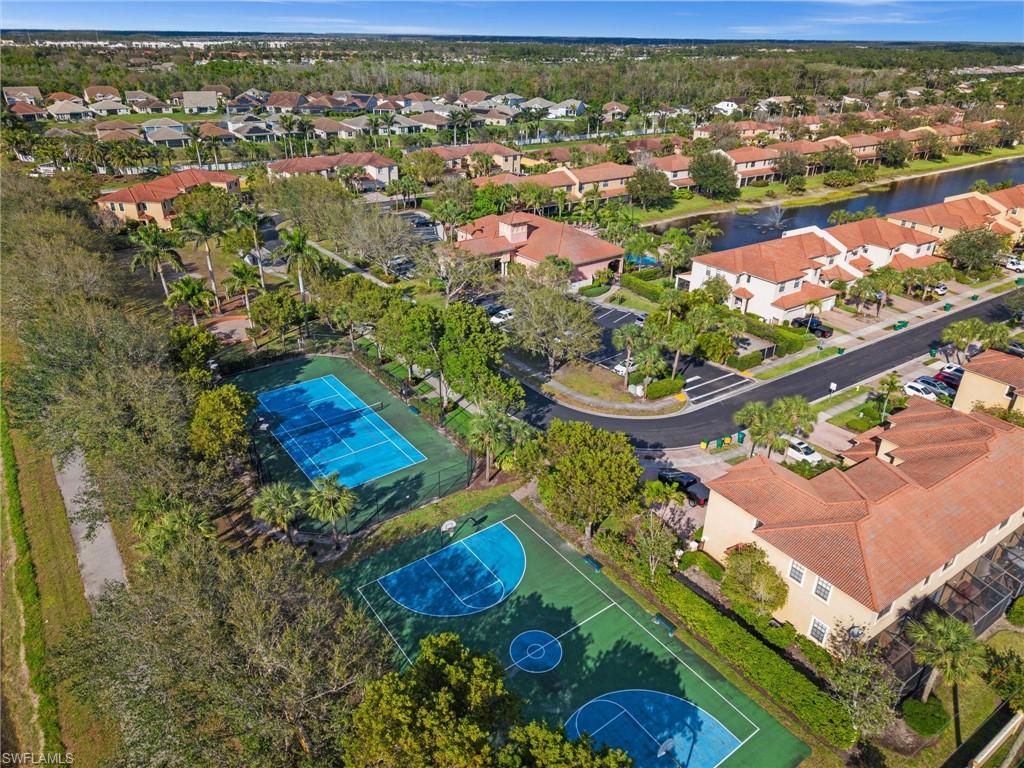 7357 Bristol Circle Naples, FL 34120 - Photo 43 of 44 an aerial view of residential houses with outdoor space