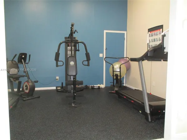 a view of a room with gym equipment