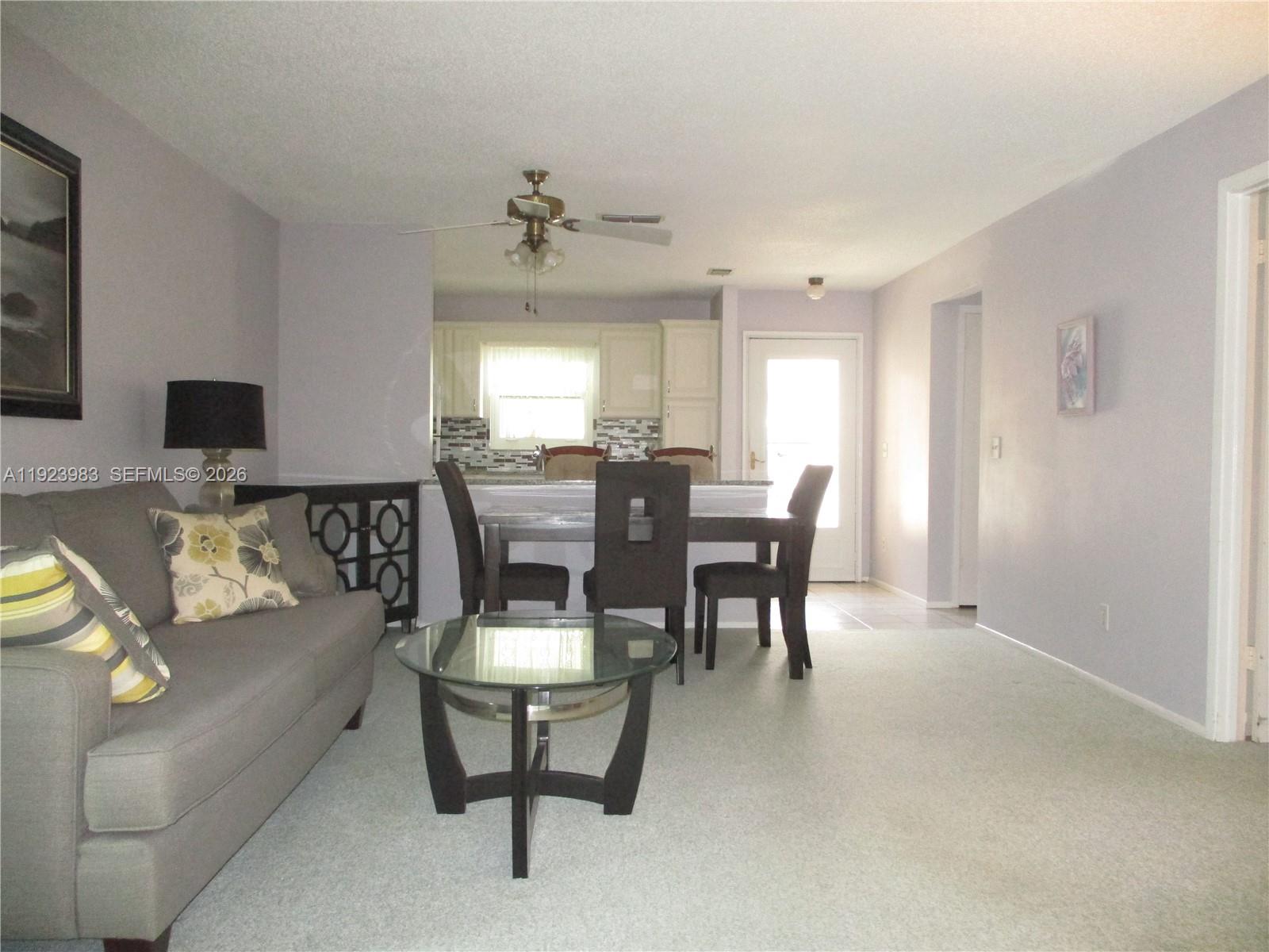 6531 Southeast Federal Highway, Unit D 112 Stuart, FL 34997 - Photo 9 of 33 A VIEW FROM THE PATIO INTO THE LIVING AREA