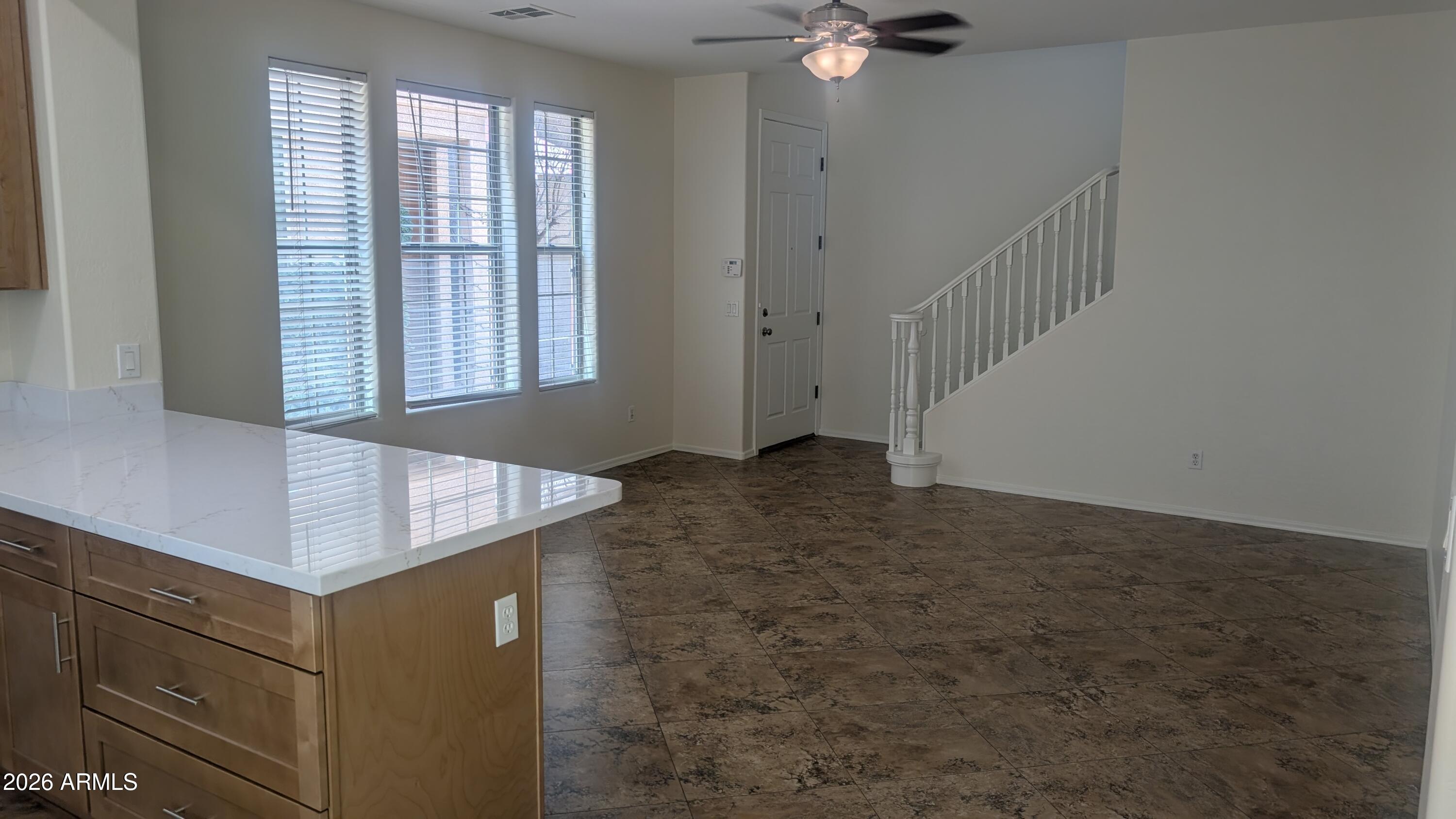1453 South Sinova Avenue Gilbert, AZ 85296 - Photo 14 of 46 a view of an entryway with a window