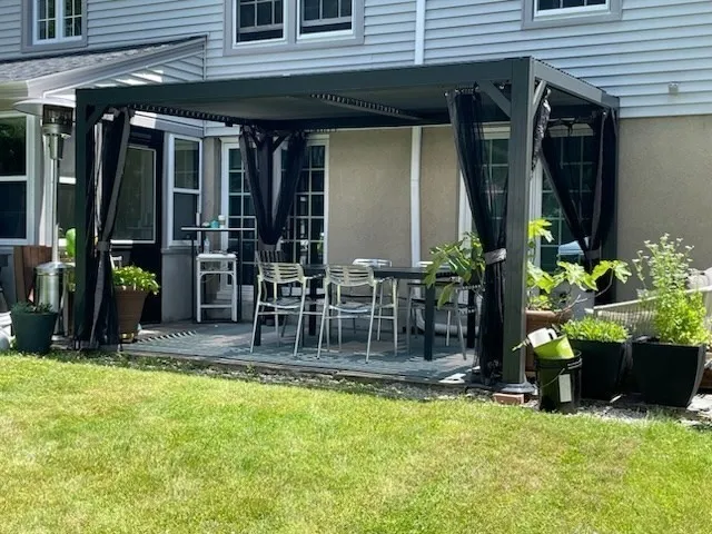 a view of building with outdoor seating