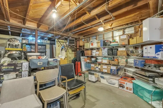 a view of a chairs and table in a room