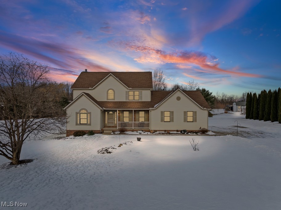 4808 Sherman Road Kent, OH 44240 - Photo 50 of 50 Snow covered rear of property with a porch