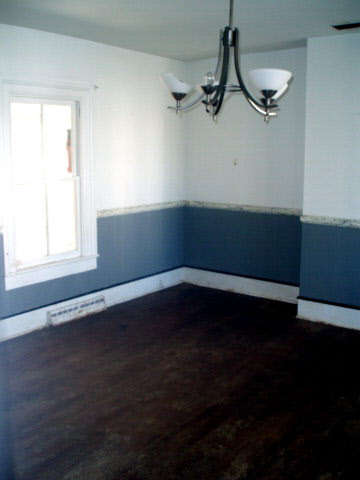 599 Battlefield Road New Hope, VA 24437 - Photo 5 of 12 a view of a room with wooden floor and windows