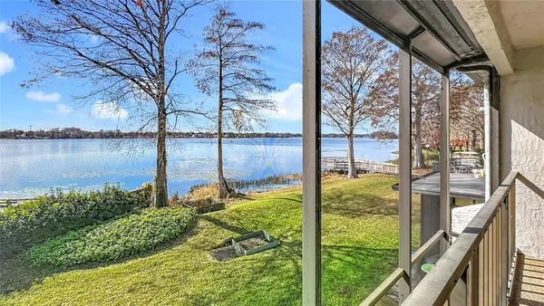 a view of a garden from a lake