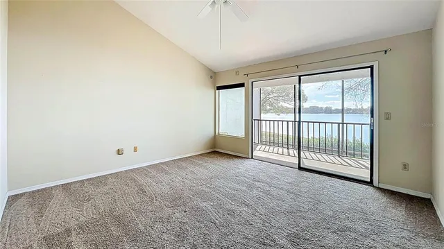 a view of a balcony with wooden floor
