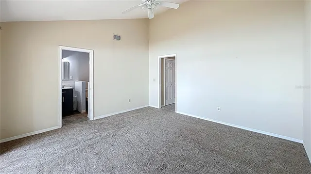 a bathroom that has a glass shower door