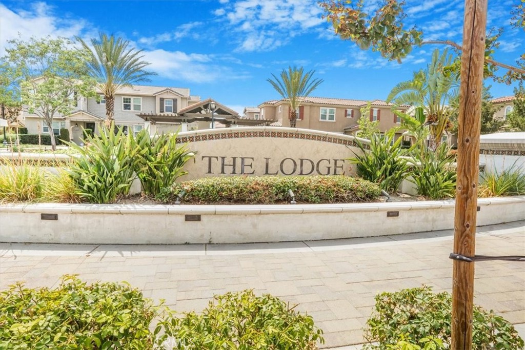 a view of a street with a building in the background