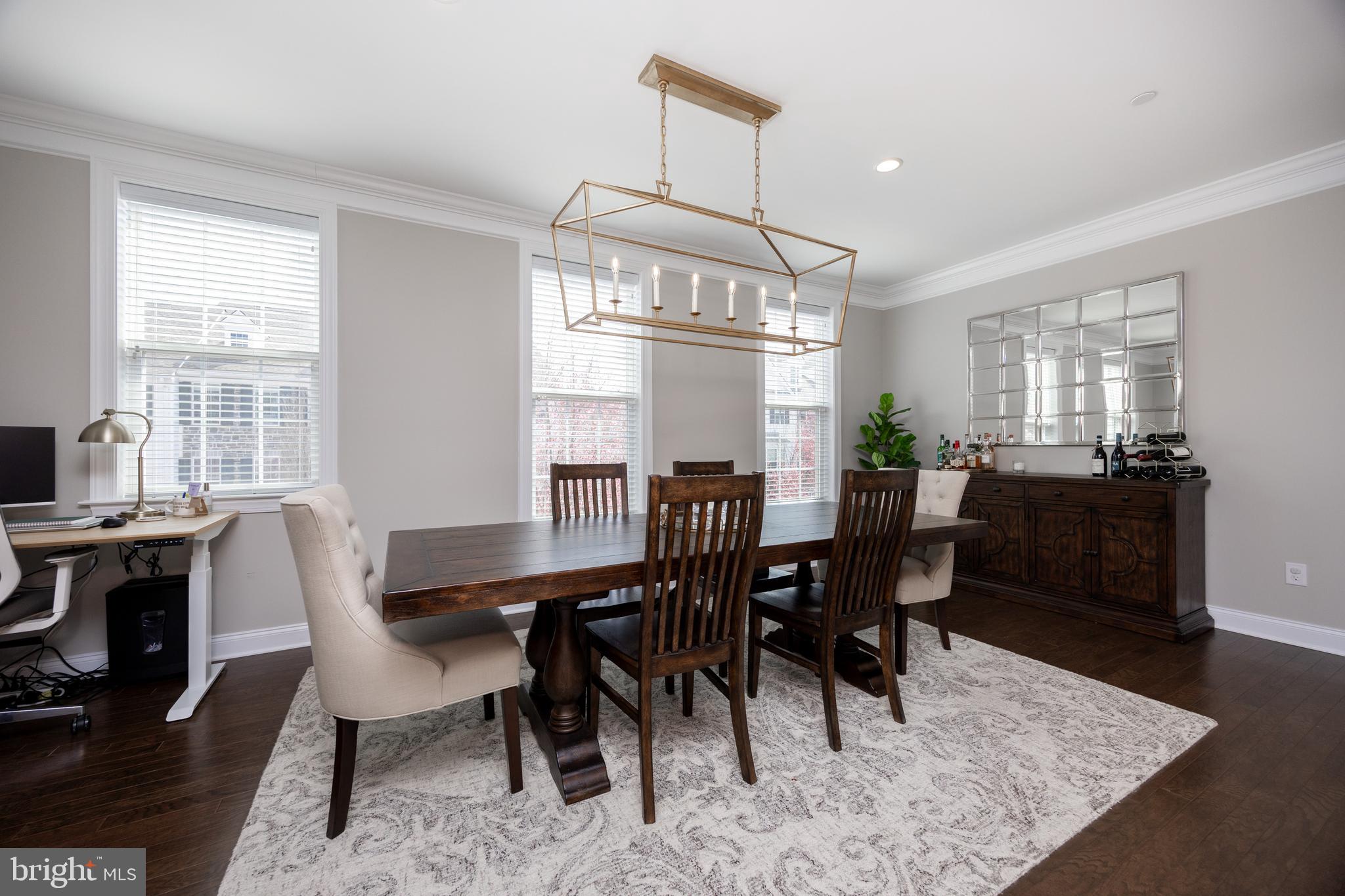 205 Murray Lane Springfield, PA 19064 - Photo 13 of 37 a view of a a dining room with furniture window and wooden floor