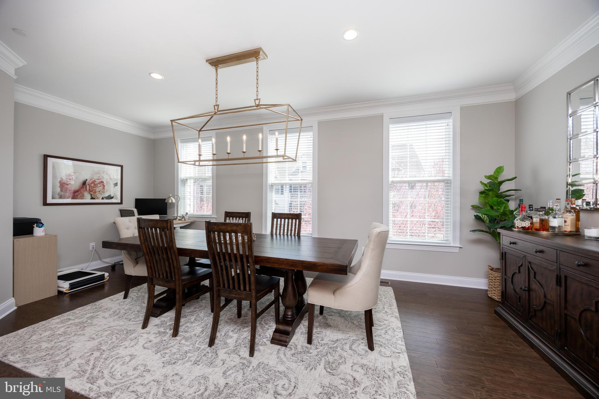 205 Murray Lane Springfield, PA 19064 - Photo 14 of 37 a view of a dining room with furniture window and wooden floor