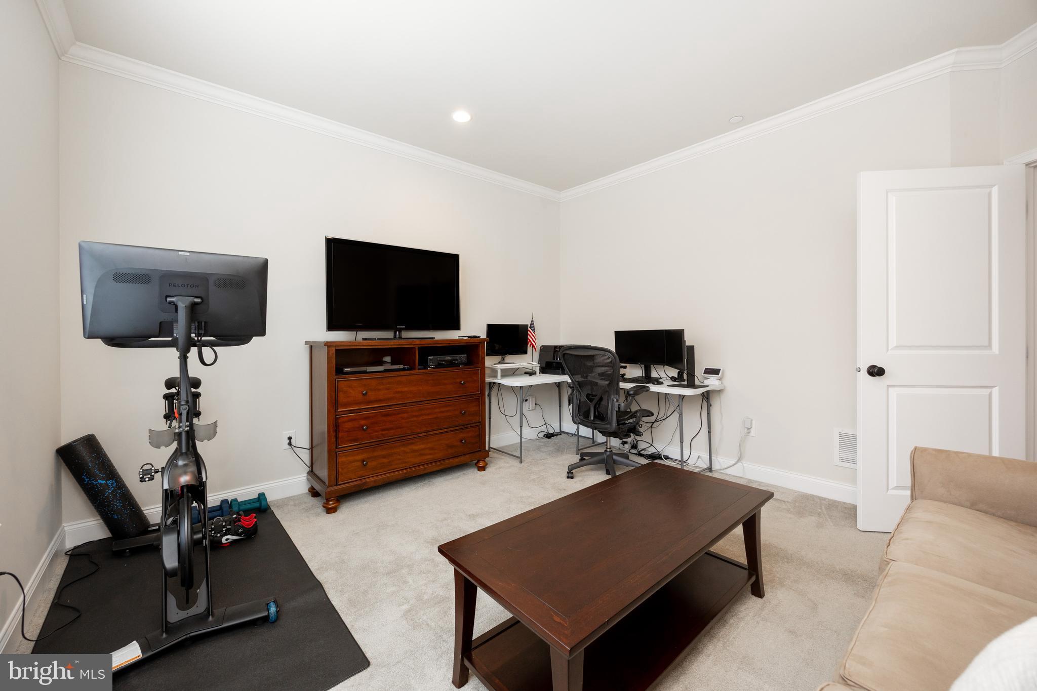 205 Murray Lane Springfield, PA 19064 - Photo 3 of 37 a living room with furniture and a flat screen tv