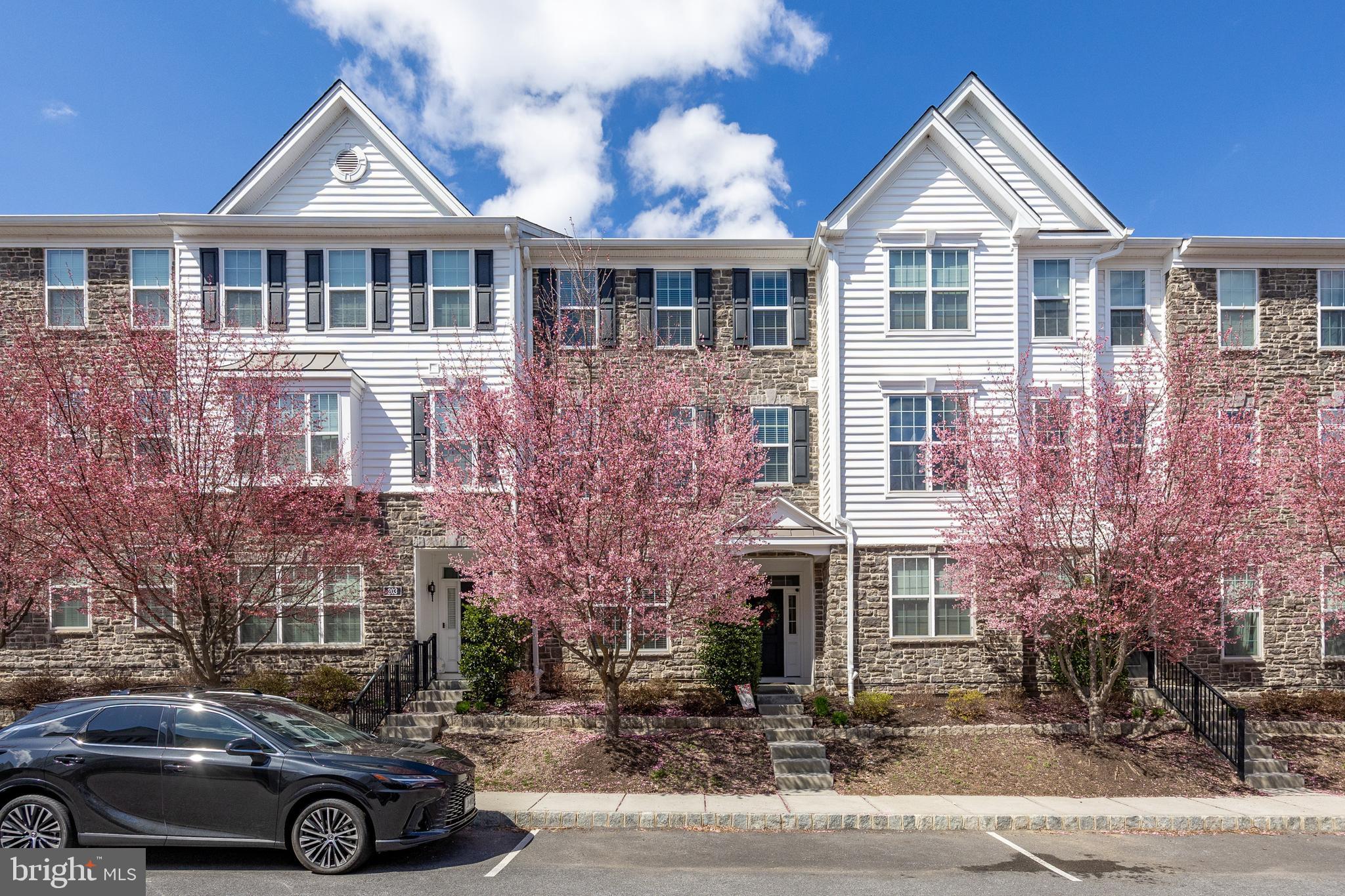205 Murray Lane Springfield, PA 19064 - Photo 32 of 37 a front view of a house with parking area