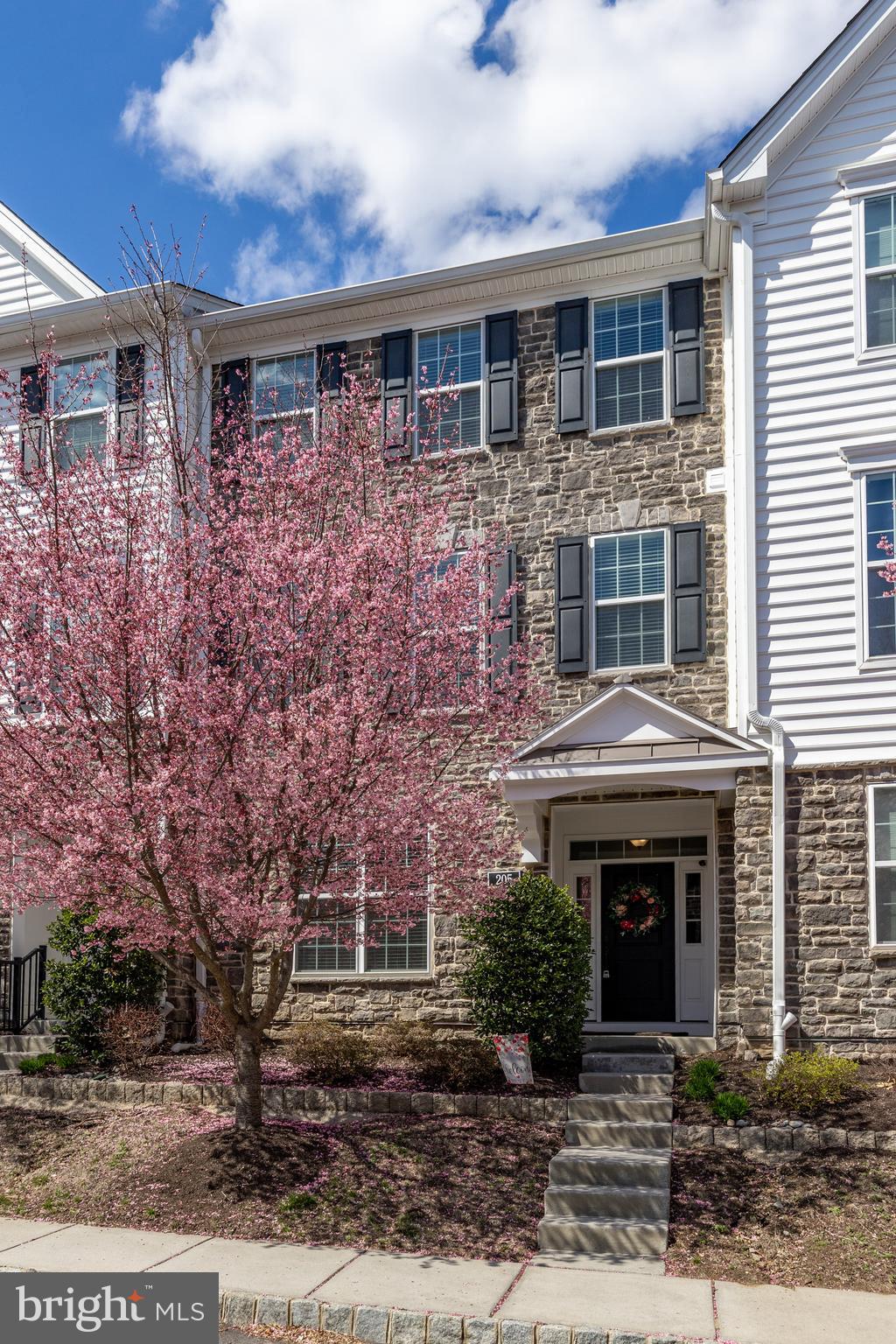 205 Murray Lane Springfield, PA 19064 - Photo 34 of 37 a front view of a house with garden