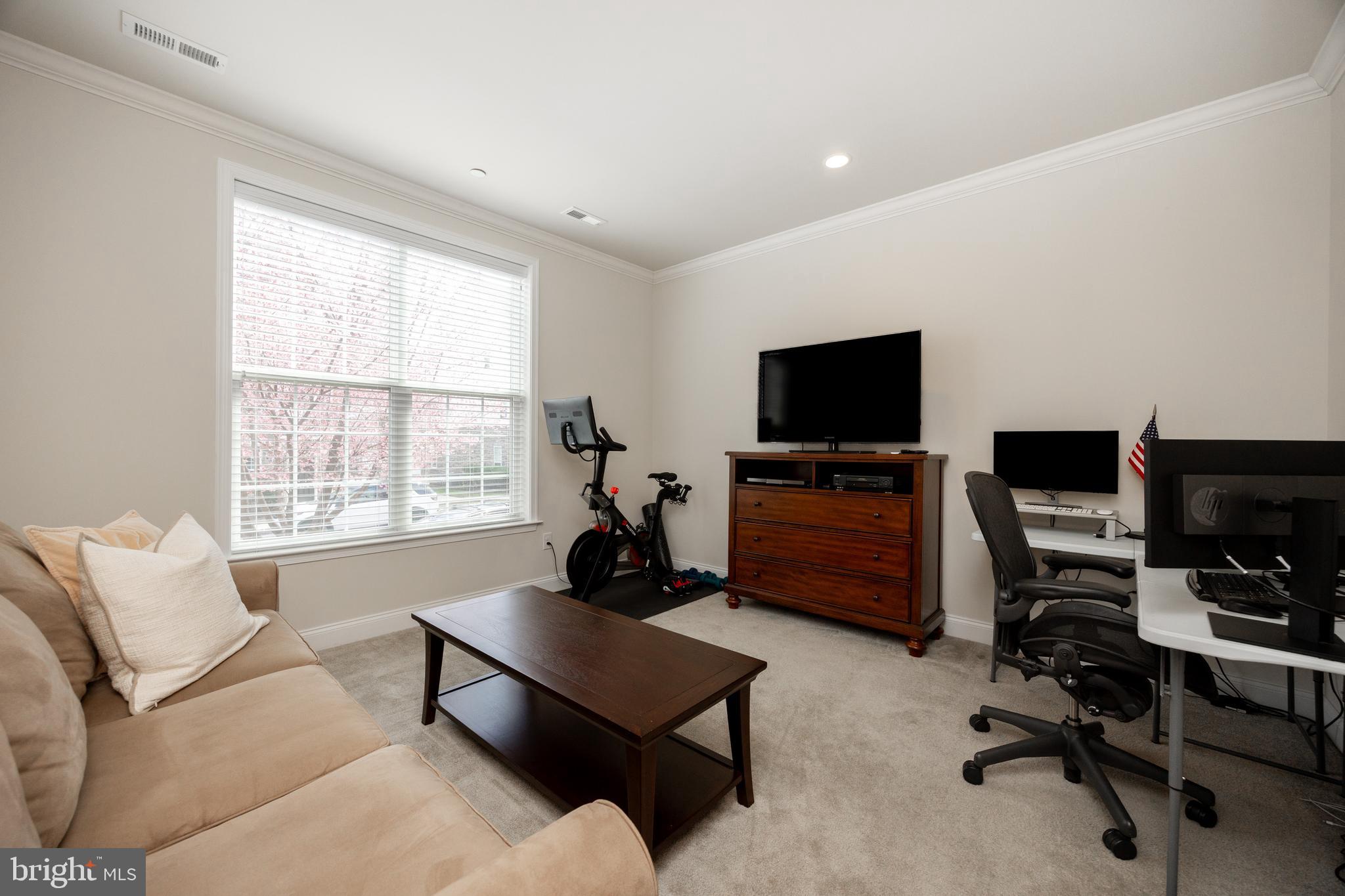205 Murray Lane Springfield, PA 19064 - Photo 4 of 37 a living room with furniture and a flat screen tv