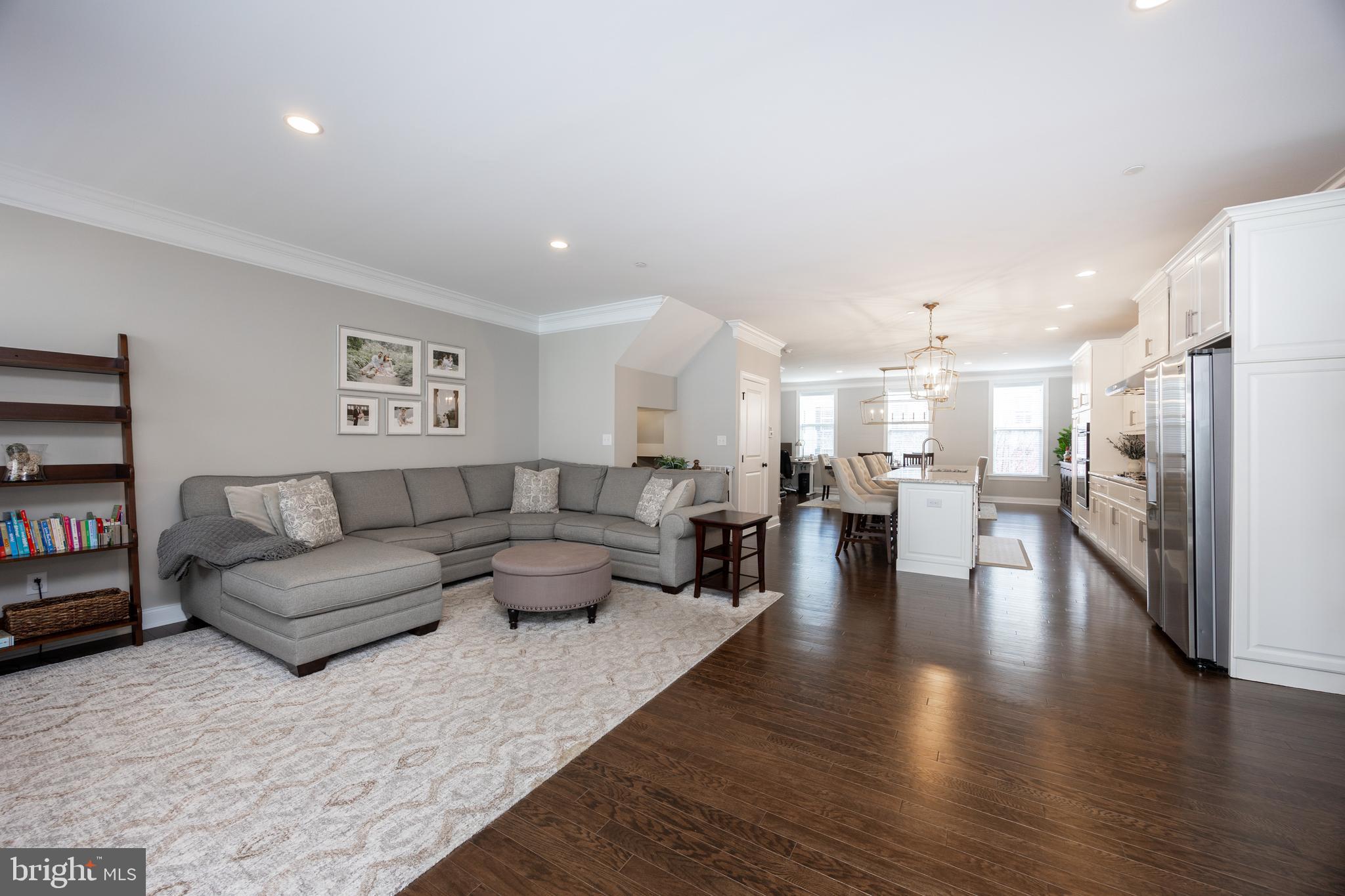 205 Murray Lane Springfield, PA 19064 - Photo 8 of 37 a living room with furniture and a view of kitchen