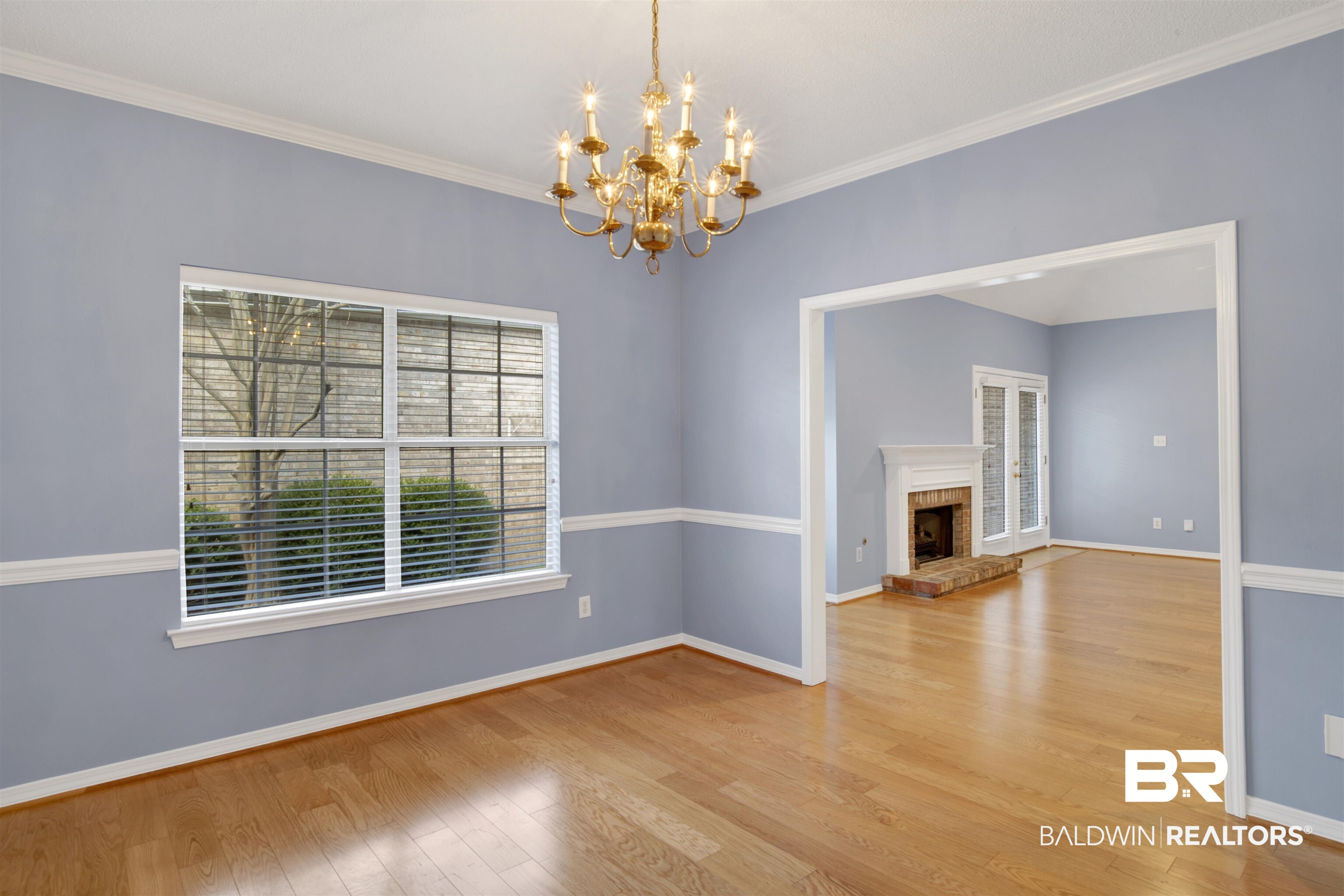 125 Woodruff Court Mobile, AL 36608 - Photo 6 of 27 Interior space featuring crown molding, a notable chandelier, light wood-type flooring