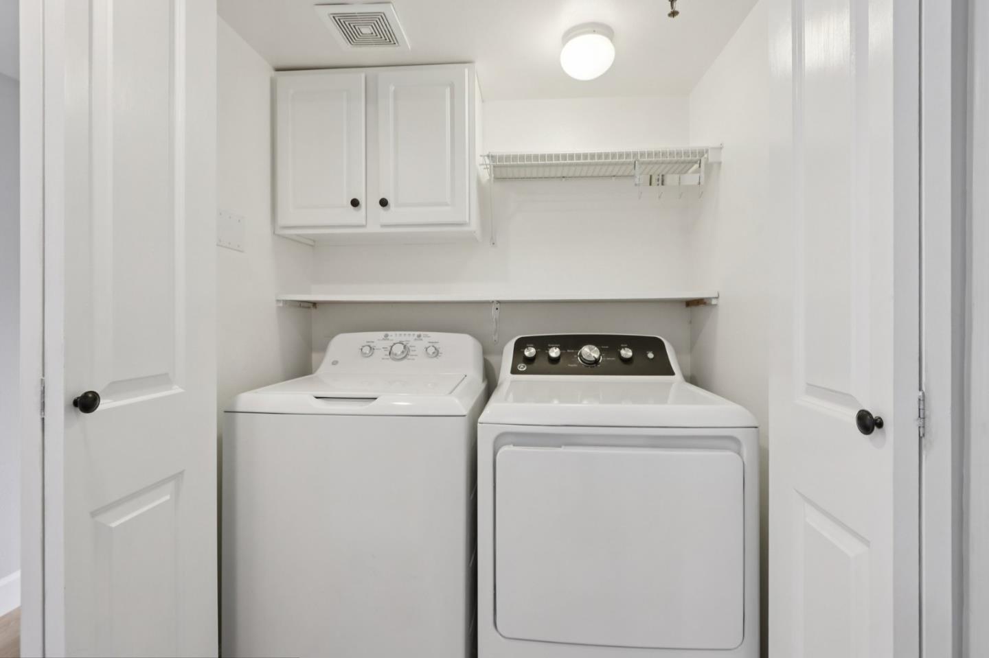 1951 O'Farrell Street, Unit 404 San Mateo, CA 94403 - Photo 19 of 28 a utility room with dryer and washer