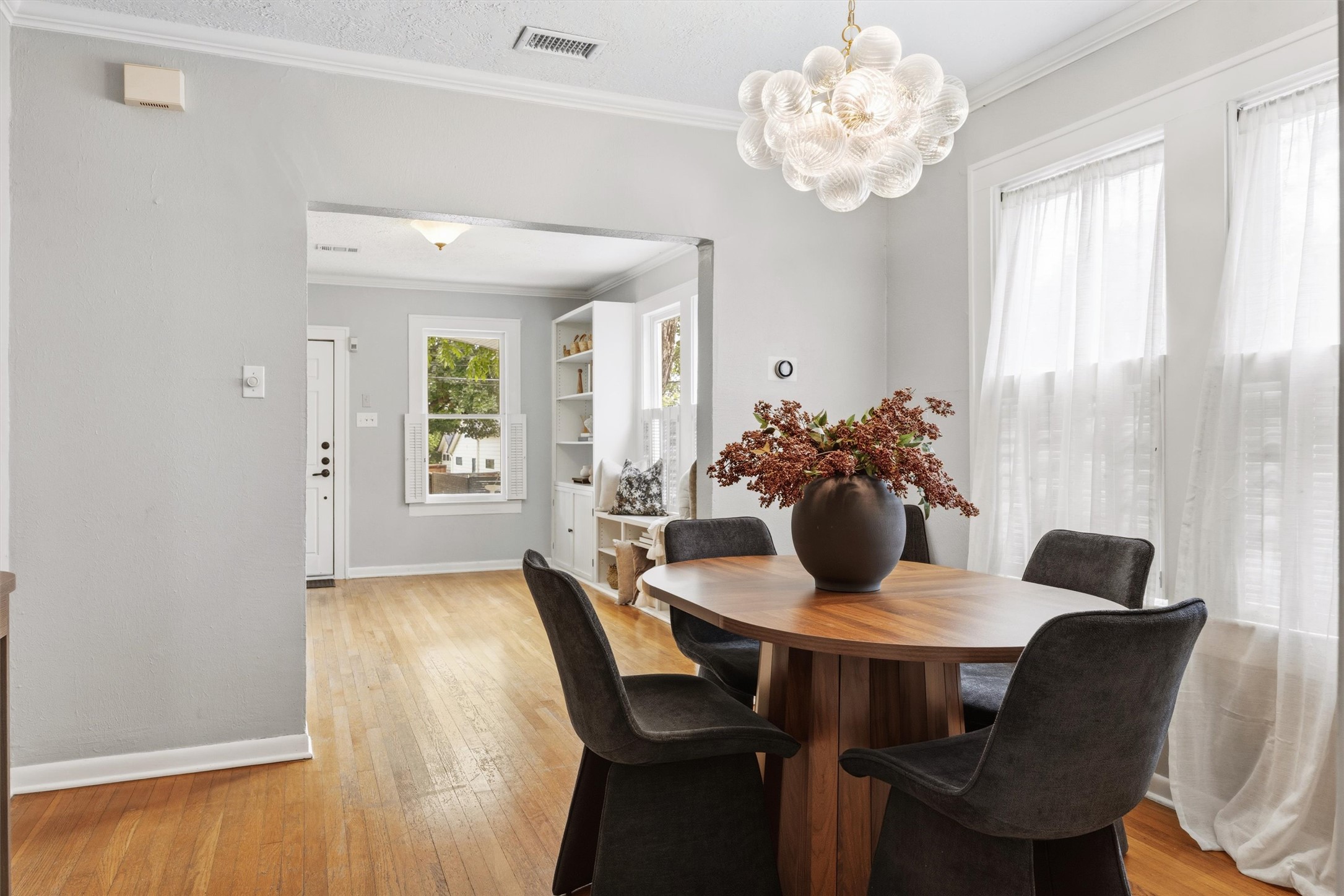 1507 Wethersfield Road Austin, TX 78703 - Photo 10 of 40 a view of a dining room with furniture window and wooden floor