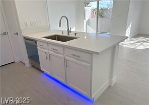 7255 West Sunset Road, Unit 2046 Las Vegas, NV 89113 - Photo 22 of 28 A sleek island kitchen with integrated lighting and seamless access to outdoor living.