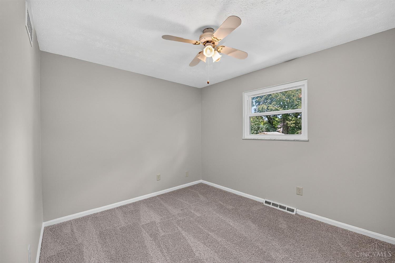 2086 Resor Road Fairfield, OH 45014 - Photo 29 of 42 Bright secondary bedroom with fresh neutral finishes, carpeting and ceiling fan.